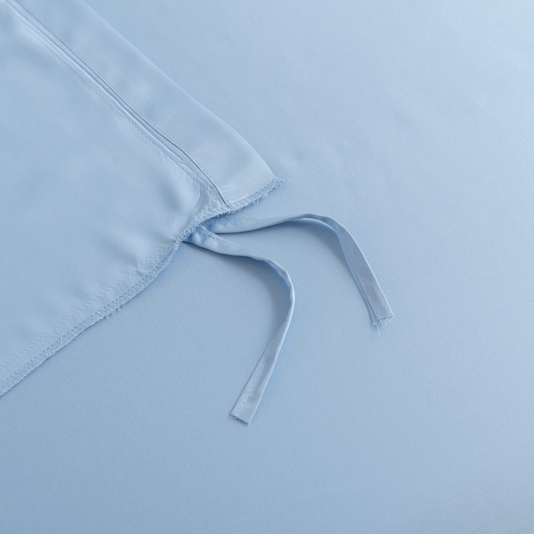 Lusjes van een dekbedovertrek in de kleur Sky Blue om het dekbedovertrek en dekbed aan elkaar vast te maken