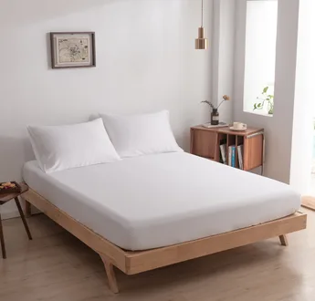 Zijaanzicht foto van een bamboe hoeslaken Coco White (kleur wit)