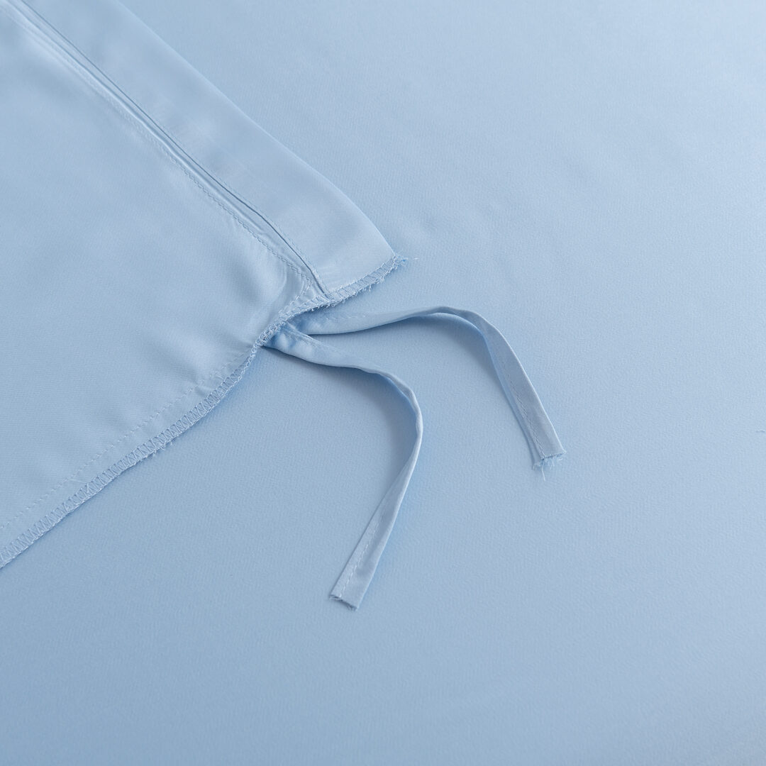 Lusjes van een dekbedovertrek in de kleur Sky Blue om het dekbedovertrek en dekbed aan elkaar vast te maken