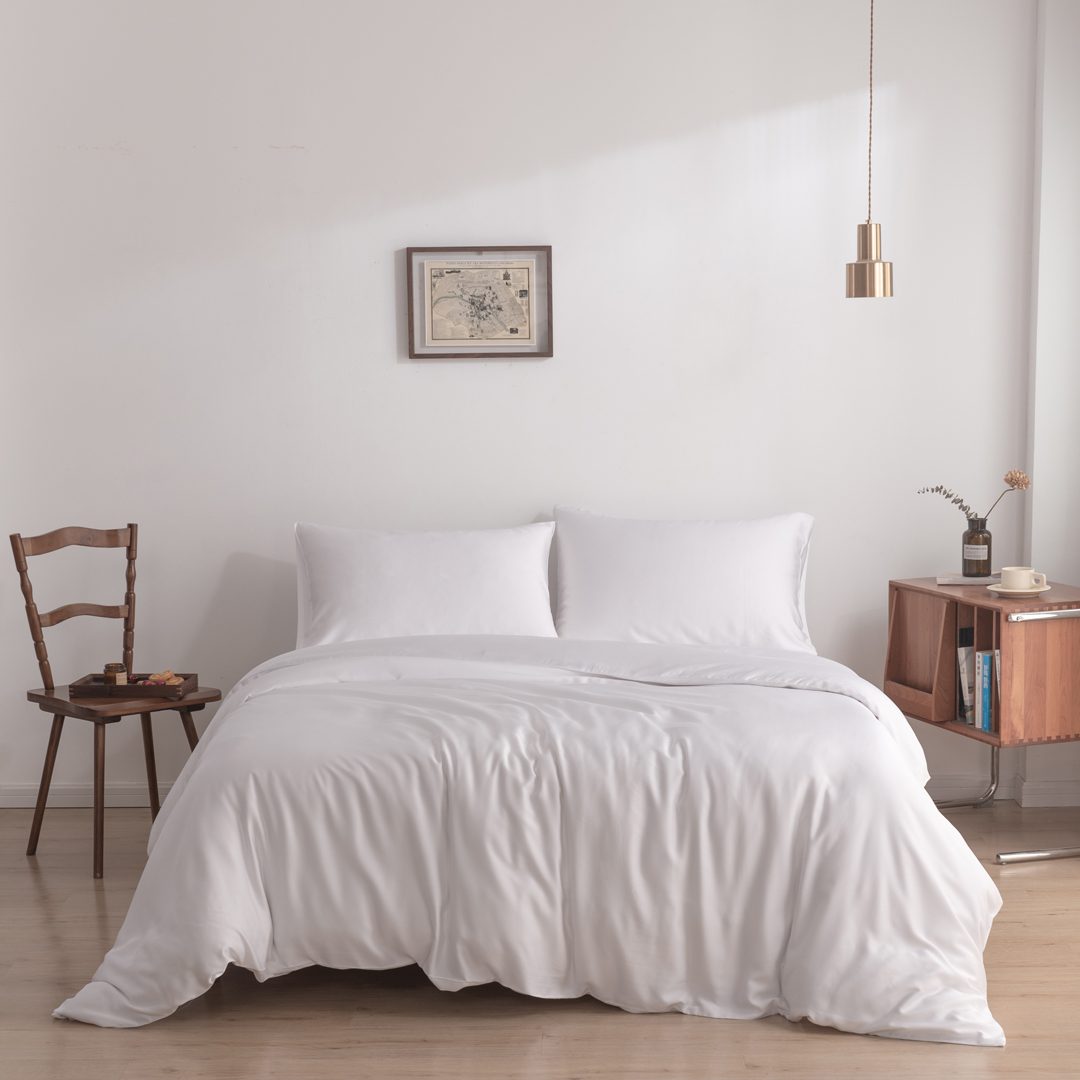 Foto van vooraanzicht van beddengoed opgemaakt op een bed Coco White op een bed (kleur wit)